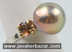 مروارید بزرگ میلو در سنجاق سینه گرن داما مروارید بزرگ میلو در سنجاق سینه گرن داما