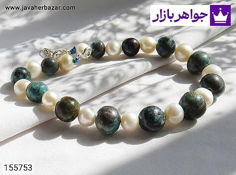 دستبند سنگی فیروزه نیشابوری و مروارید زنانه دستبند سنگی فیروزه نیشابوری و مروارید طرح آسمان زنانه - 155753