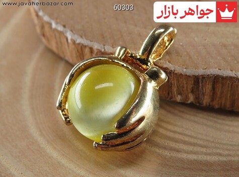 مدال تیتانیوم چشم گربه زرد طرح دست و دلبر - 60303