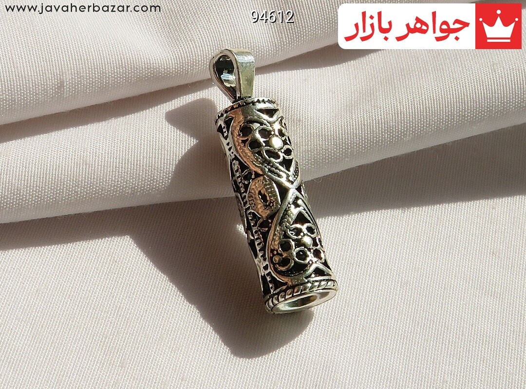 مدال نقره به همراه حرز امام جواد روی پوست آهو
