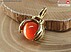 مدال تیتانیوم چشم گربه نارنجی طرح دست دلبر-1