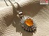 مدال عقیق یمنی نارنجی طرح شمس-1