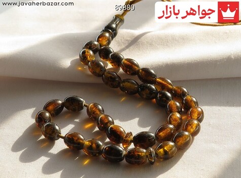 عکس تسبیح کهربا قهوه‌ای 33 دانه